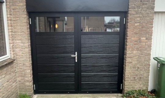 openslaande garage deuren geplaatst Oosterhout